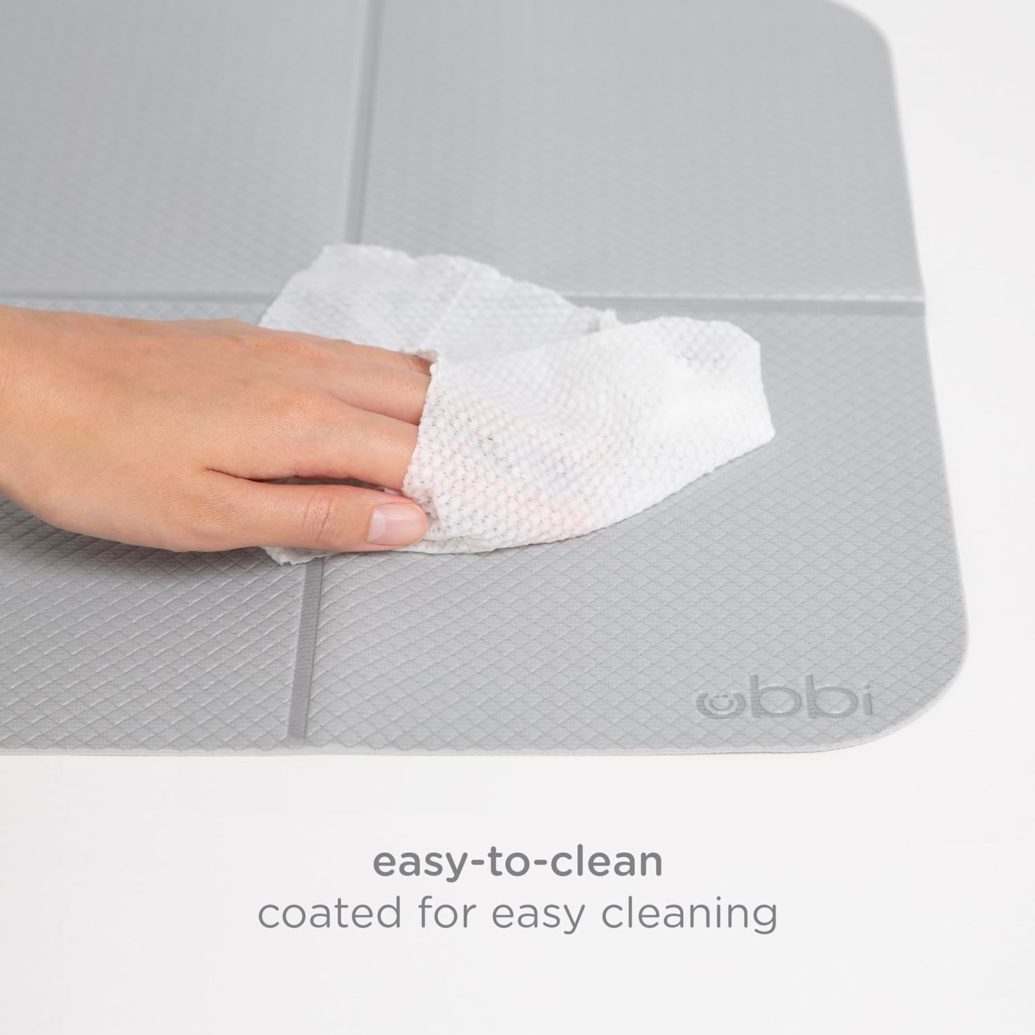 ubbi on the go changing mat with carrying case, soft and comfortable nappy bag accessory must have for newborns, easy to clean, portable changing pad, grey ubbi on the go changing mat with carrying case, soft and comfortable nappy bag accessory must have for newborns, easy to clean, portable changing pad, grey